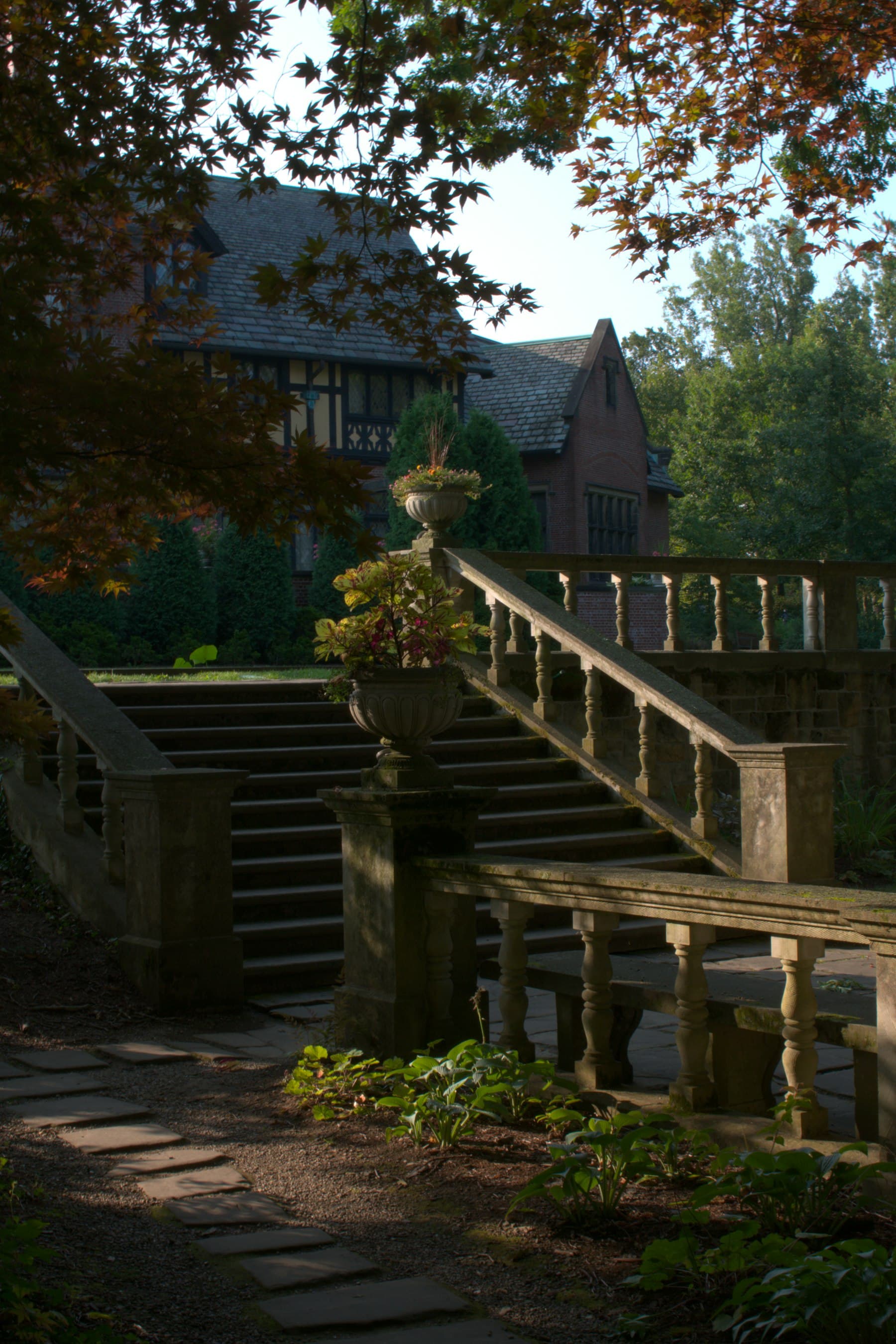 Sample exterior photo of a clean upscale suburban home with a landscaped entry.